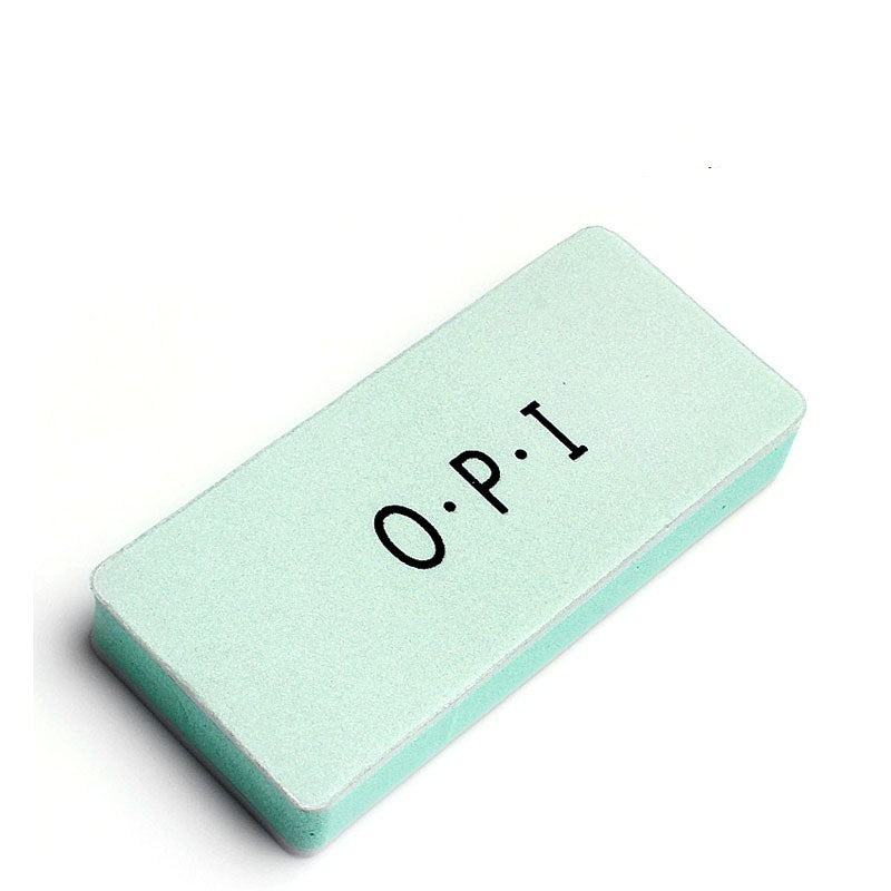 Green nail buffer with 'O.P.I' branding on a white background